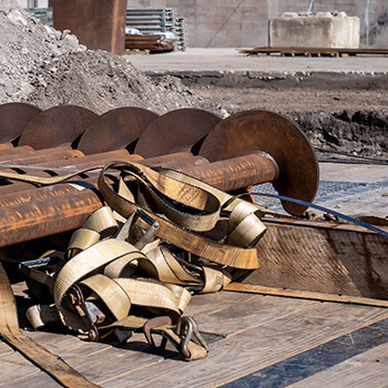 Helical Piles loaded on a flatbed trailer